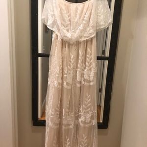 Off white medium/large dress. Off the shoulder.